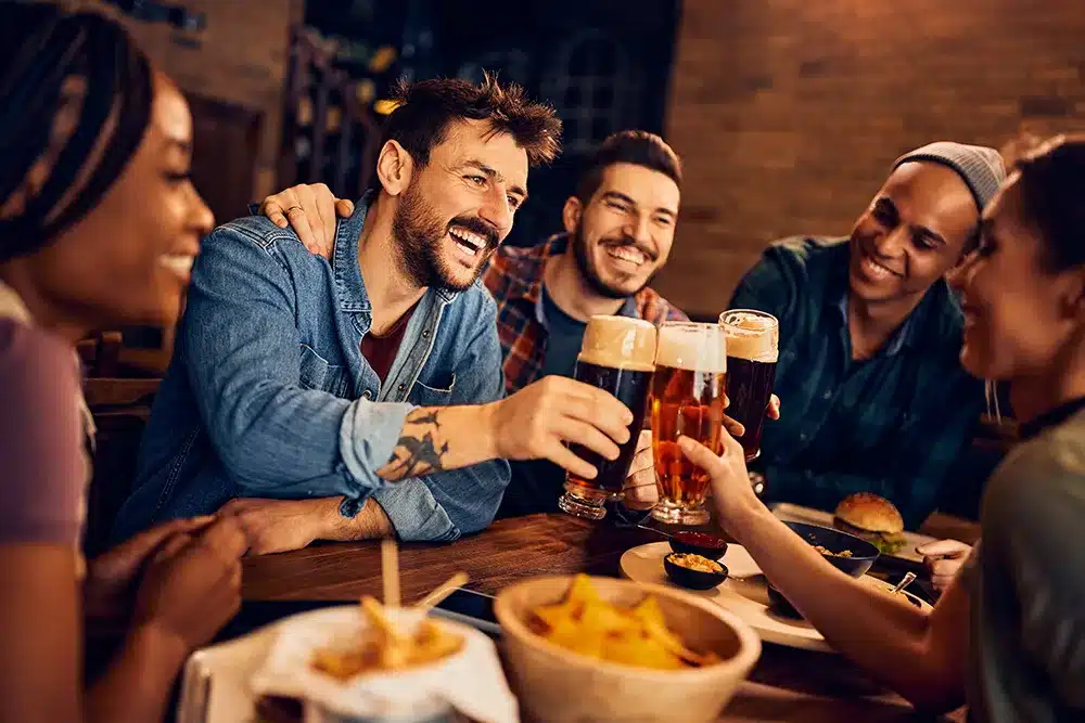 Architectural Services Scotland – Alcohol Licensing Plans – featured image of adults having a beer in a bar Architectural Services Scotland - Alcohol Licensing Plans - featured image of adults having a beer in a bar